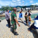 Personil Pos Pam Pelabuhan Lama Kota Sibolga Menyampaikan Himbauan, Jaga Anak-Anaknya Saat Bermain
