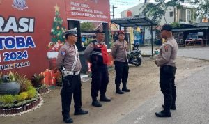 Polres Tanjung Balai Laksanakan Pengamanan di Pos Pam 1 Jalan Sudirman Image