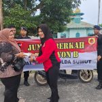 Brimob Polda Sumut dan Bhayangkari Tebar Kepedulian, Gelar Jum’at Berkah Berbagi Makan Siang di Kampung Wetan Tanjung Balai