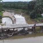 PalmCo Perbaiki Jembatan Sungai Sosa, Penghubung Vital 13 Desa di Padang Lawas