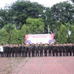 Polres Langkat Upacara Peringatan Hari Bela Negara ke-77 dan Penyerahan Paket Natal Tahun 2025