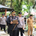 Polres Langkat Gelar Upacara Tradisi Kepolisian Untuk Almarhum AIPTU Suriadi